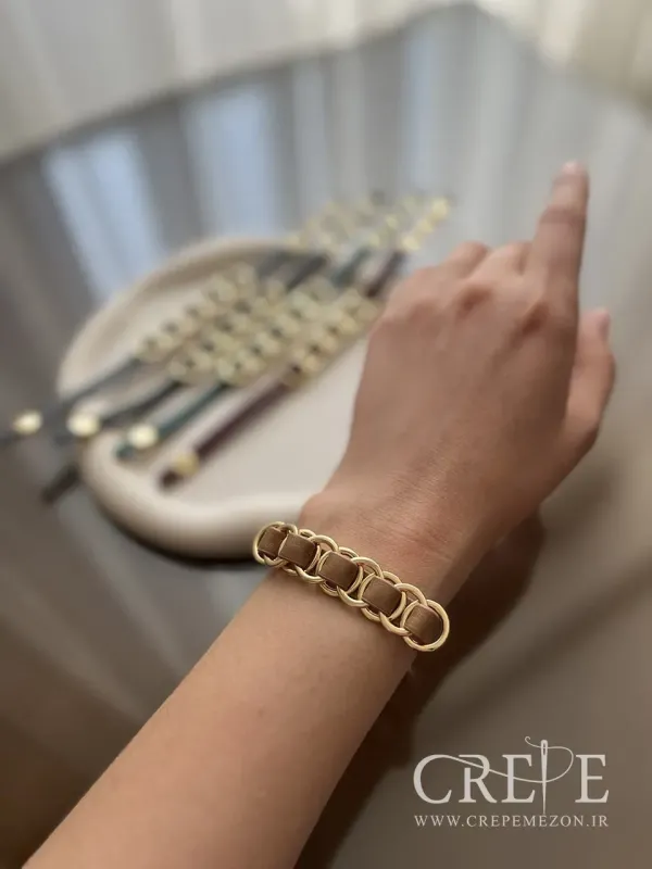 دستبند چرم طرح برند