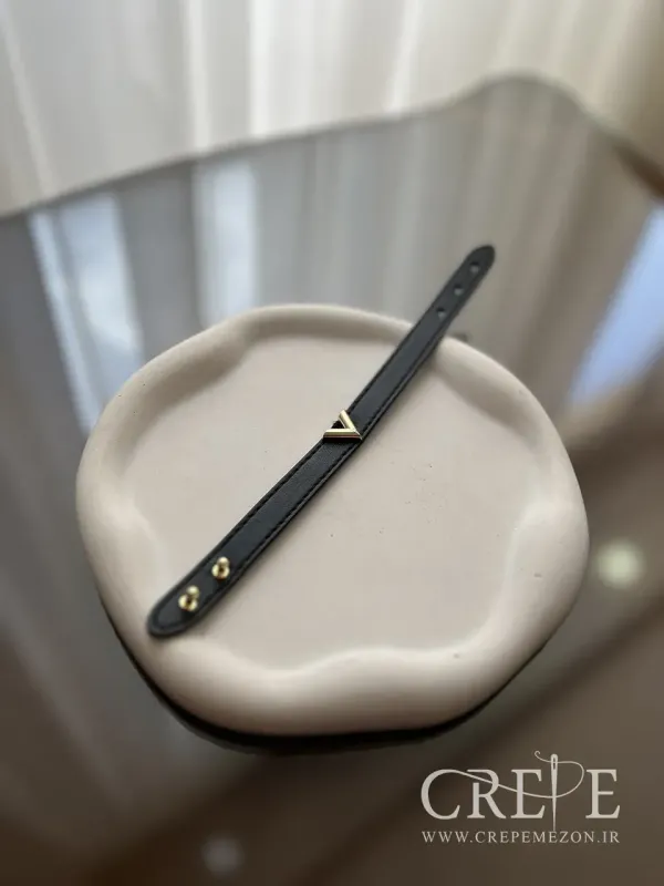 دستبند چرم طرح برند