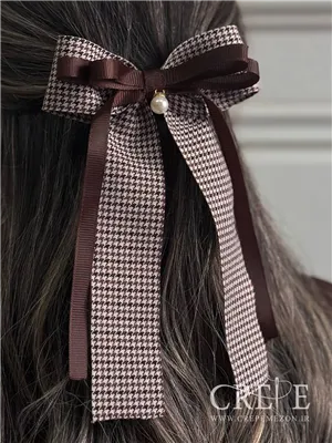 گیره پاپیون و مروارید دنباله دار